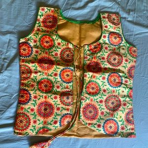 pure silk jacket with sleeves on side that you can wear under blouse/top/T-shirt